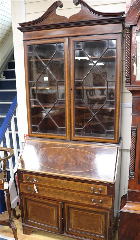 An Edwardian inlaid mahogany bureau bookcase W.96cm